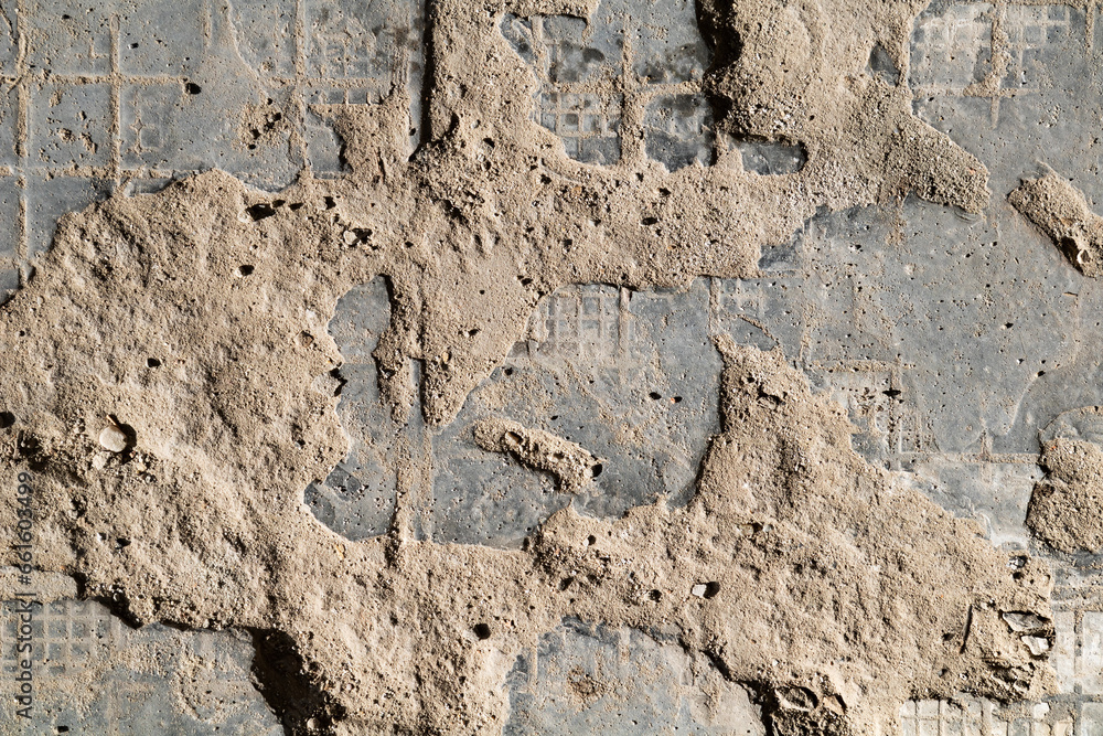 Fototapeta premium Cracked and abstract grunge texture. Aged material surface backdrop. Weathered effect pattern. Old and dirty background.