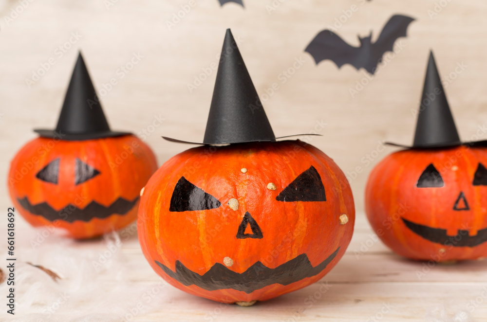 Halloween composition with jack o lanter decor on wooden background Halloween composition with jack o lanter decor on wooden background