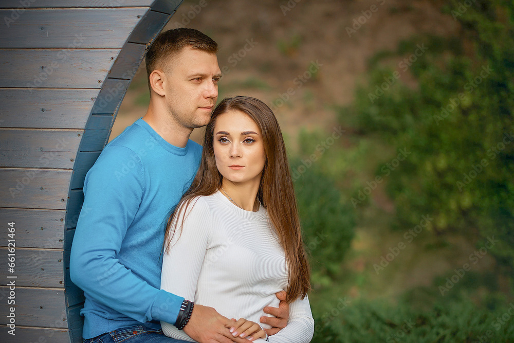 Photo of young attractive gentle sweet amorous affectionate couple cuddling enjoying rest romance outdoors Photo of young attractive gentle sweet amorous affectionate couple cuddling enjoying rest romance outdoors