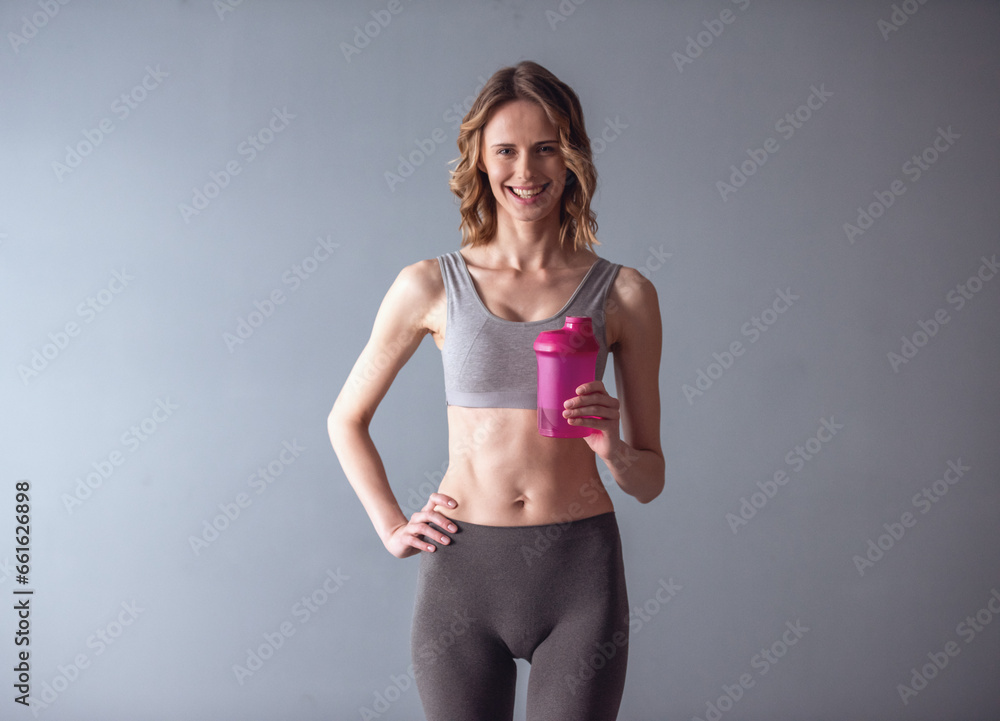 Woman with sport nutrition Woman with sport nutrition