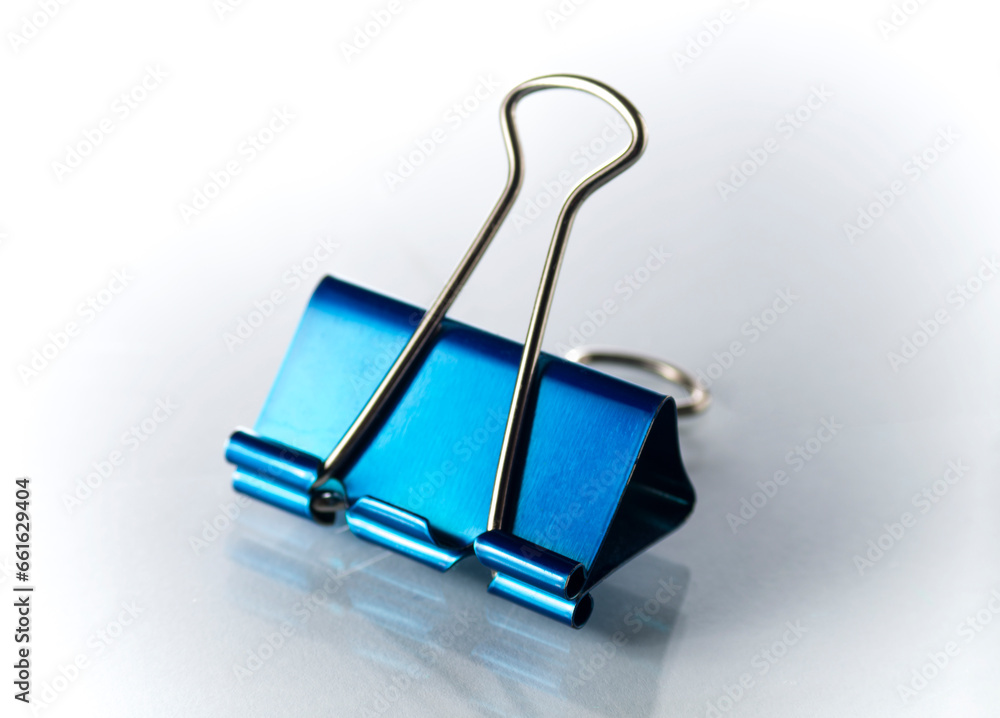 One blue binder on a white background One blue binder on a white background