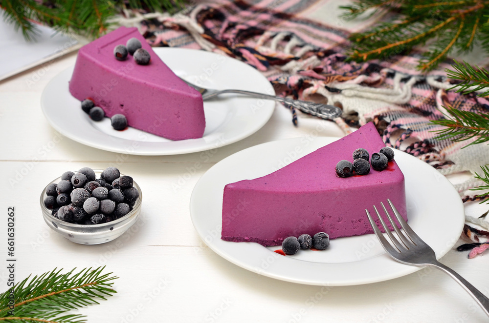 still life with a colorful purple dessert with blueberries on the table still life with a colorful purple dessert with blueberries on the table