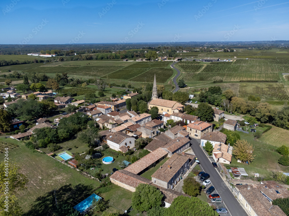 Aerial view on Sauternes village and vineyards, making of sweet dessert Sauternes wines from Semillon grapes affected by Botrytis cinerea noble rot in Bordeaux, France