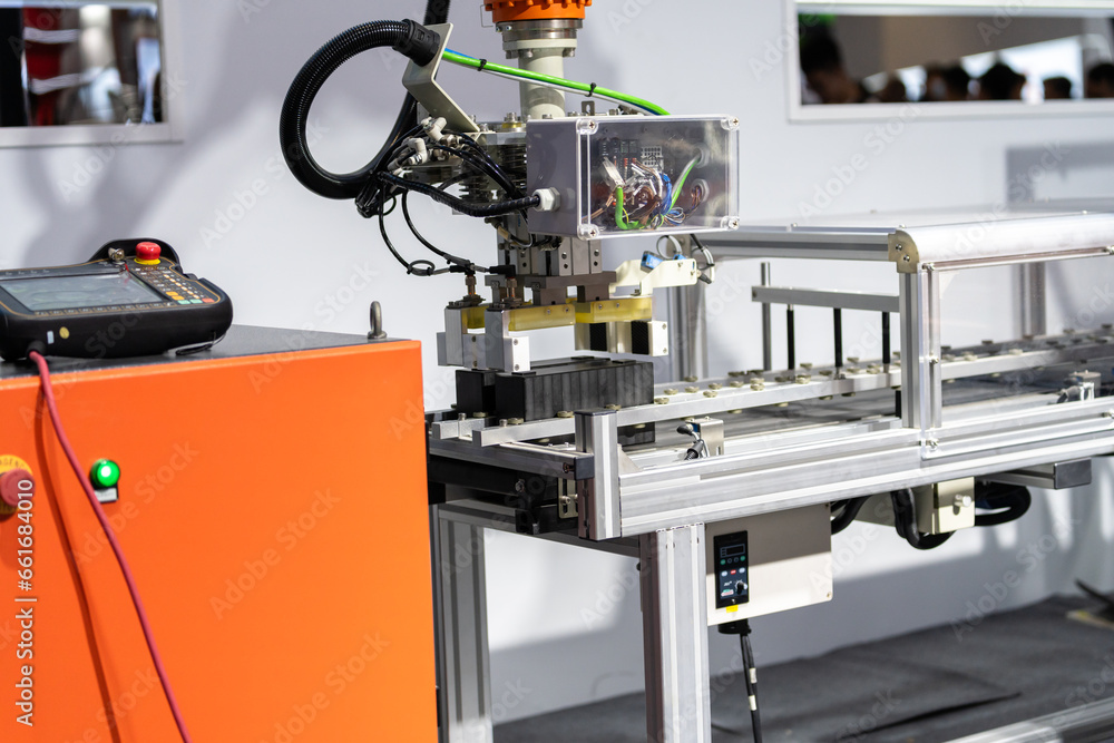 robot arm working in car factory robot arm working in car factory