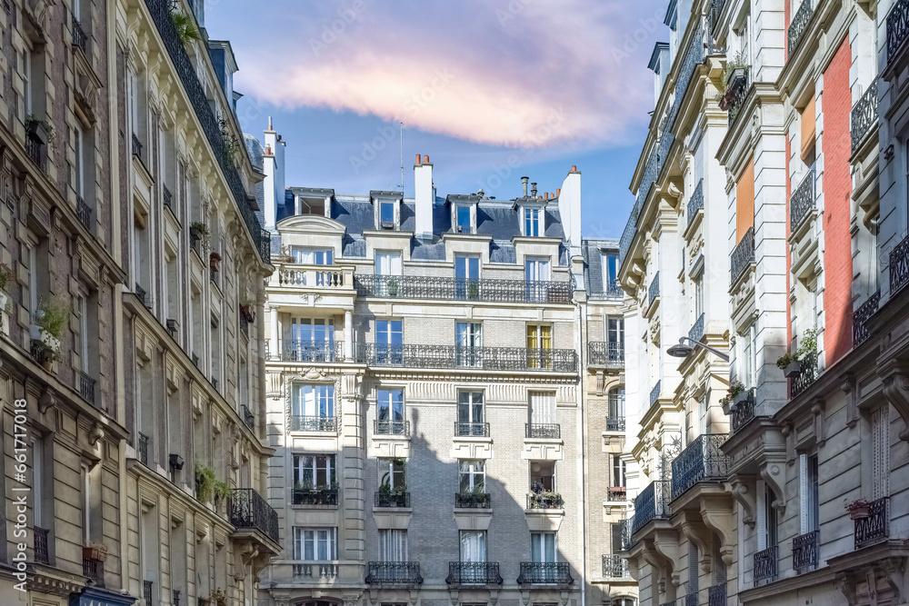 Paris, typical facades and windows, beautiful buildings in Montmartre