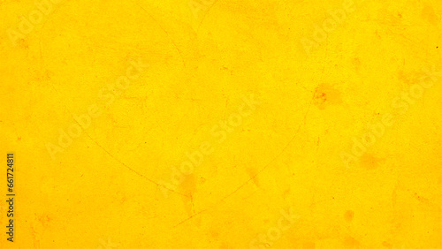 Close-up of yellow textured background. Grunge wall texture. High resolution vintage background.