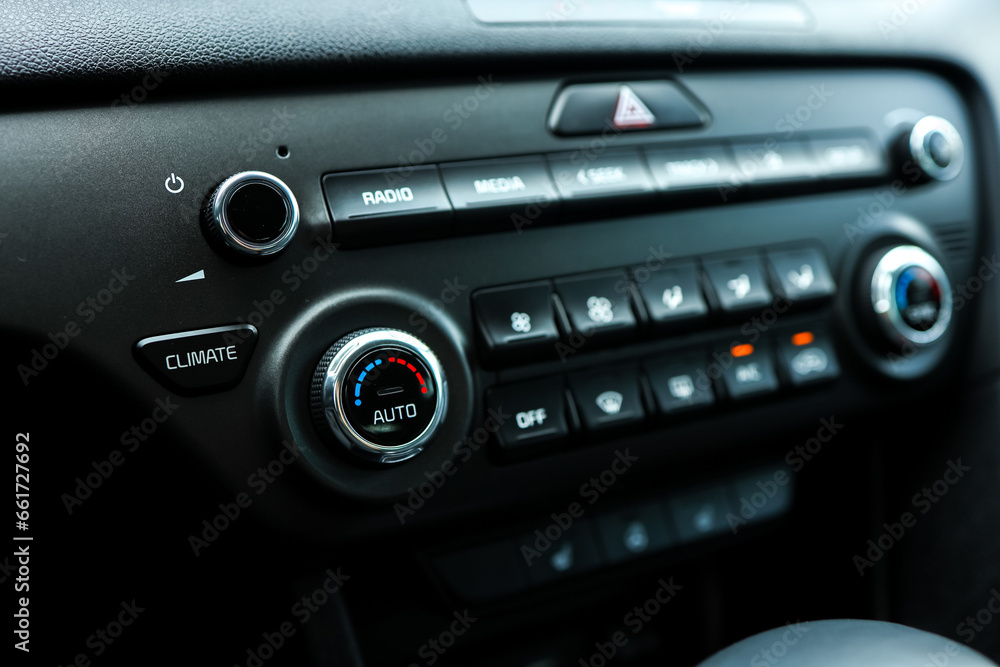 Modern car climate control panel for driver and passenger with shallow depth of field. Zone climate control. Car interior detail Modern car climate control panel for driver and passenger with shallow depth of field. Zone climate control. Car interior detail