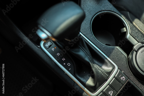 Selector automatic transmission with leather in the interior of a modern expensive car photo