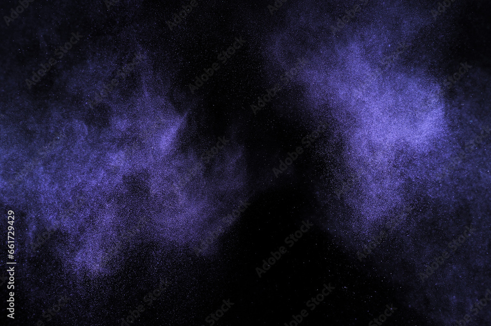 Purple powder explosion on black background. Mauve color cloud. Violet dust explode. Freeze motion paint Holi. Purple powder explosion on black background. Mauve color cloud. Violet dust explode. Freeze motion paint Holi.