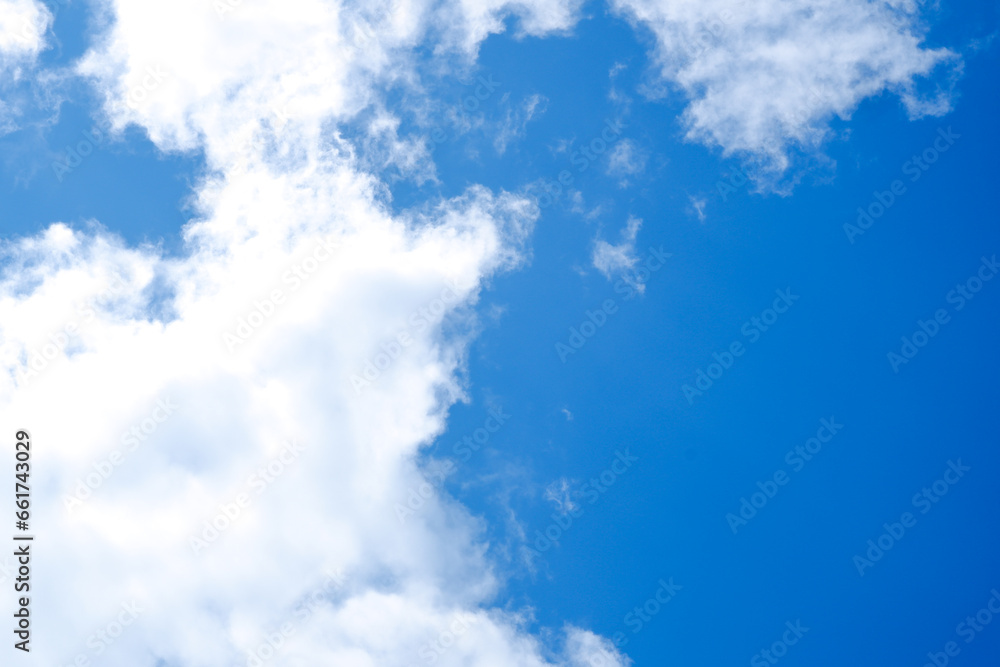 Fototapeta premium White clouds in the sky. Sunny day. Background. Graphics for illustration.