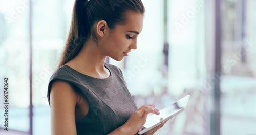 Business, woman and planning on tablet with app for research, reading information and update software. Office worker scroll on digital technology, social network and online for website connection photo