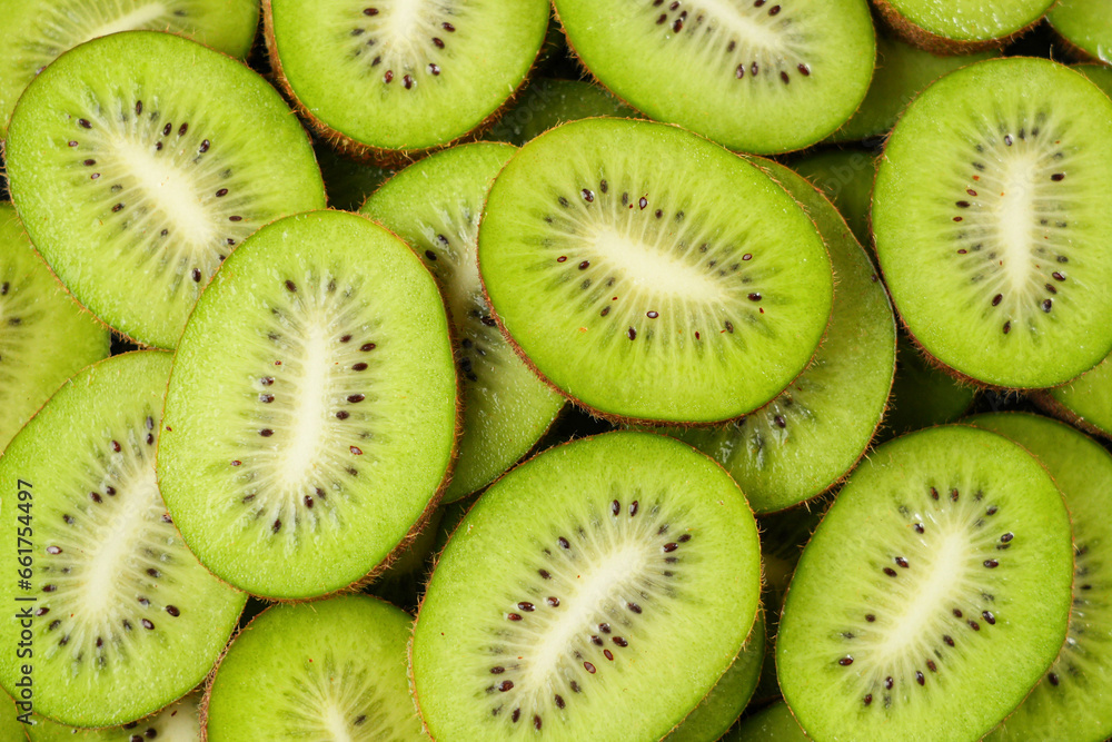 Fresh kiwi fruit slices texture background Fresh kiwi fruit slices texture background