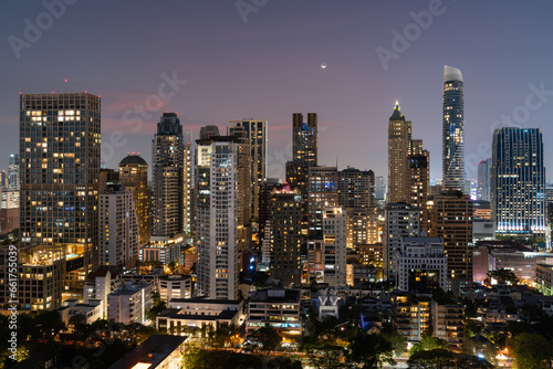 Panoramic view on night Bangkok skyline, skyscrapers and lights