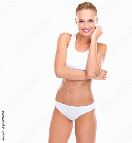 Woman, underwear and fitness, body and portrait with health and wellness isolated on white background. Skin, exercise and smile with transformation or change, nutrition and weight loss in studio © Arcurs Corp/peopleimages.com