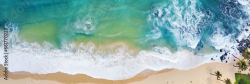 overhead photo of a desert island beach in the middle of the ocean 