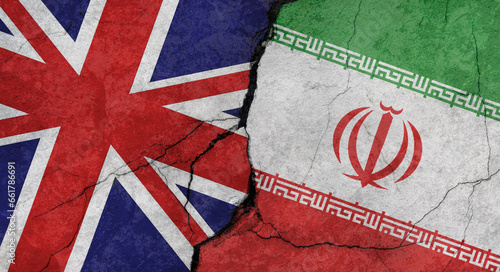 Wallpaper Mural UK and Iran flags, cracked concrete wall texture, grunge background, military conflict concept Torontodigital.ca