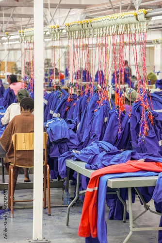 industrial textile factory in africa producing workwear, the sewing hall with the automated line