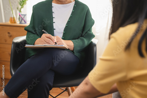 psychotherapist talking to teenage during mental therapy session