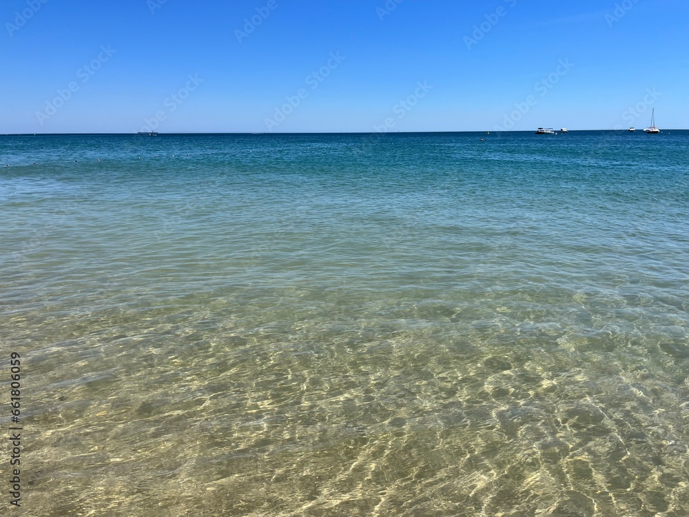 Blue sea horizon, transparent sea surface with ripples, clear blue sea and blue sky Blue sea horizon, transparent sea surface with ripples, clear blue sea and blue sky