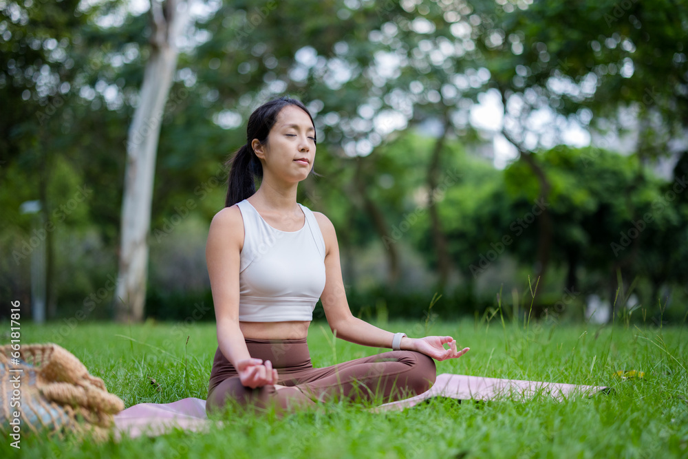 Woman do meditation at park Woman do meditation at park