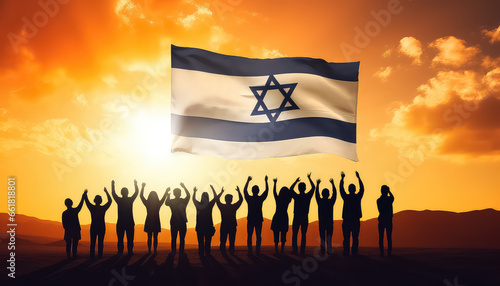 Group of people with israeli flag on sunset background