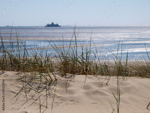 Ferry Voyage: Sand Dunes with Beach Grass Overlooking the North Sea and Distant Ferry