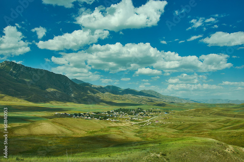 Mountain plateau, road to Kazarman,  Kyrgyzstan photo