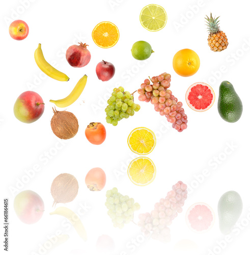 Fototapeta Naklejka Na Ścianę i Meble -  Falling colorful vegetables and fruits with light reflection isolated on white