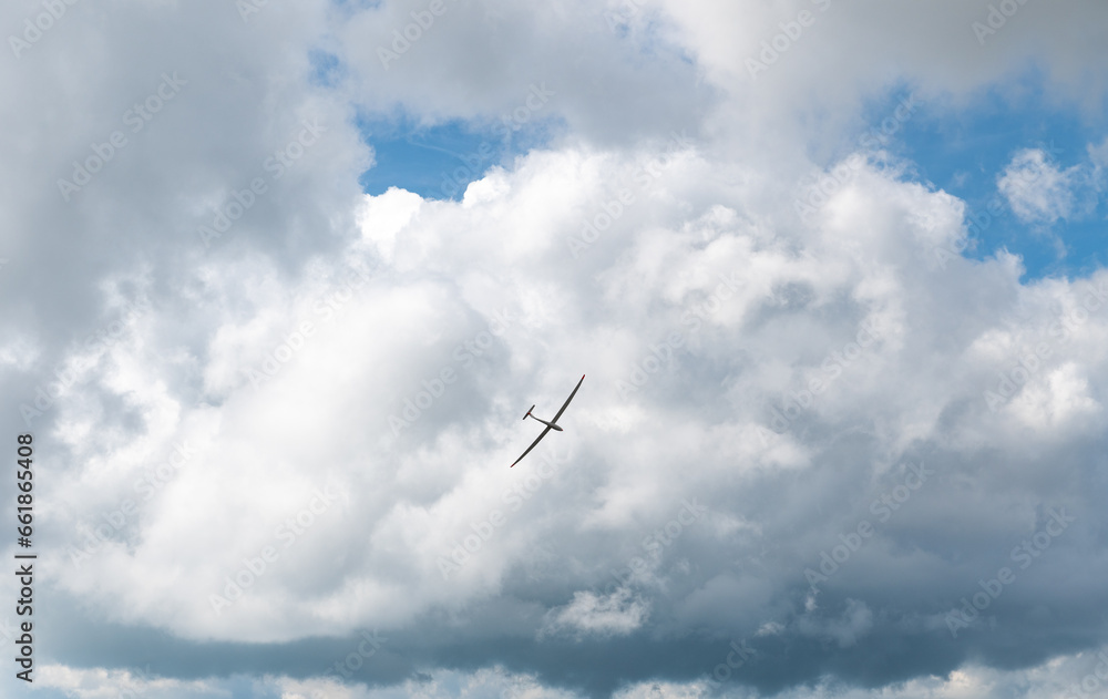 Gliderplane soaring high in the sky Gliderplane soaring high in the sky