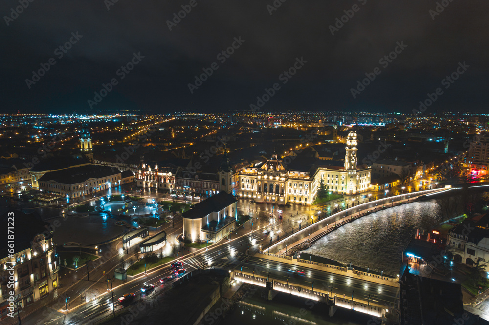 Fototapeta premium Oradea romania tourism aerial a breathtaking aerial view of a historic European city illuminated at night
