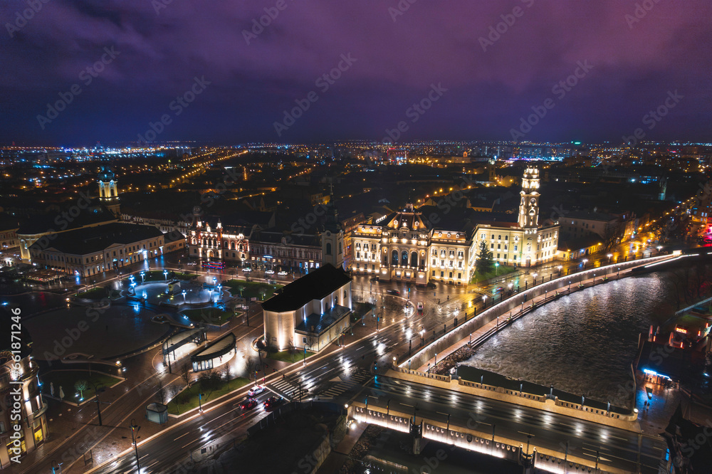 Oradea romania tourism aerial a dazzling nighttime cityscape with historic landmarks and cultural attractions illuminated