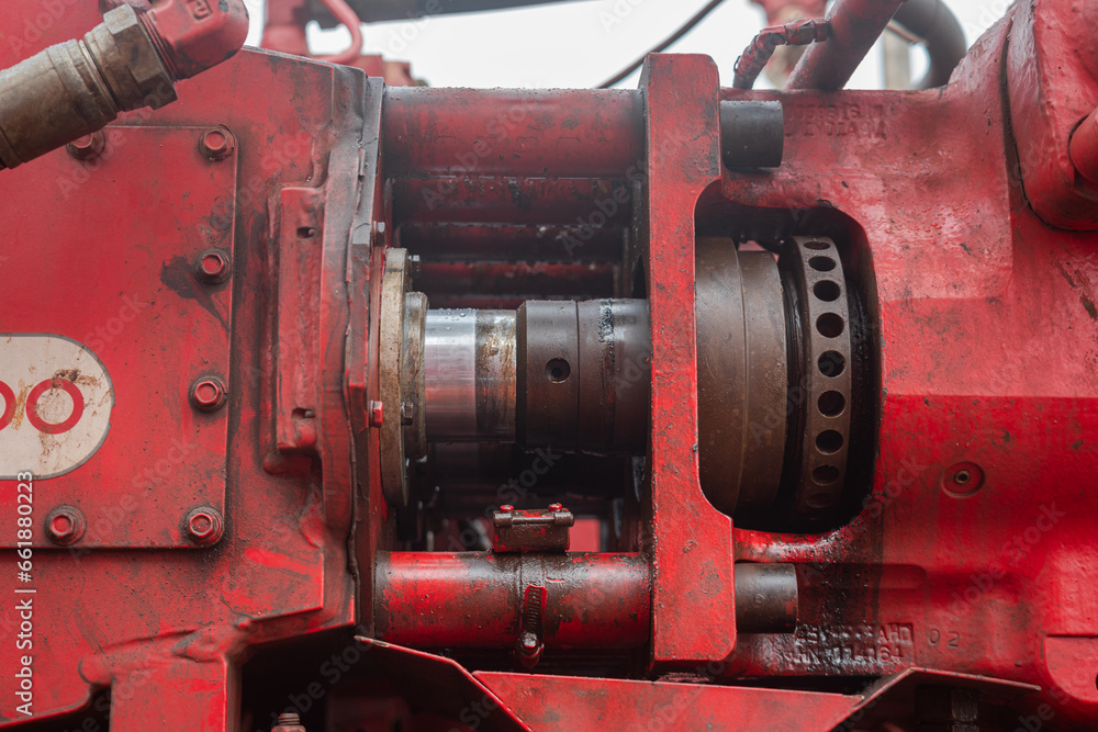 Part of the water pumping unit plunger shaft which is the main component to drive to pressure to fluid. Industrial machinery equipment object, selective focus. Part of the water pumping unit plunger shaft which is the main component to drive to pressure to fluid. Industrial machinery equipment object, selective focus.
