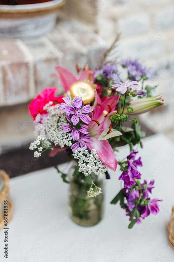 Flower decoration on a table at a wedding Flower decoration on a table at a wedding