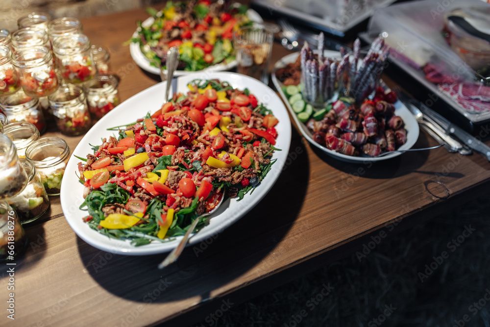 Delicious buffet at a garden party wedding reception Delicious buffet at a garden party wedding reception