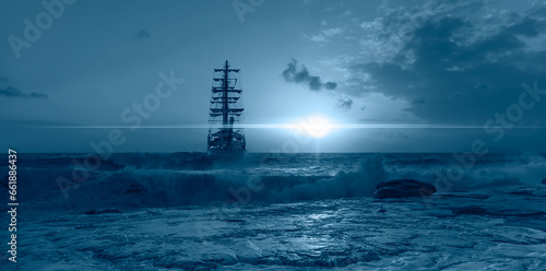 Sailing old ship in a storm sea in the background stormy clouds © muratart
