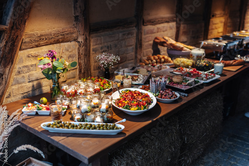 Fototapeta Naklejka Na Ścianę i Meble -  Delicious buffet at a garden party wedding reception