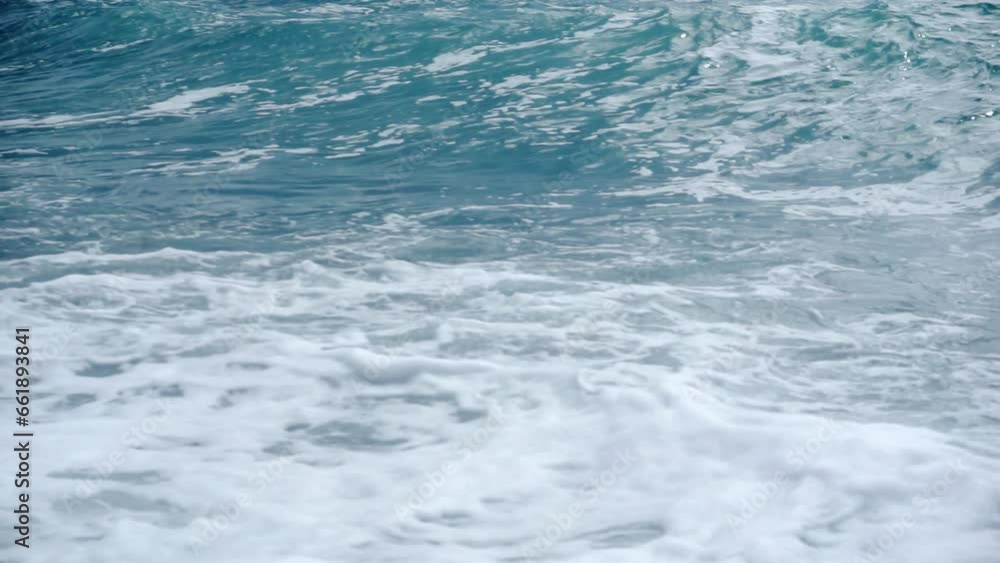 Foamy seawater, with raging waves. Foamy seawater, with raging waves.