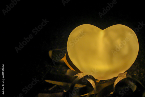 This is a heart-shaped lamp that symbolizes love and will be a guiding light in the darkness.