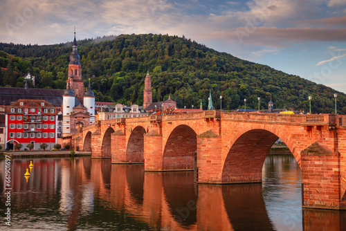 Heidelberg, Germany. Cityscape image of historical city of Heidelberg, Germany with Old Bridge Gate at autumn sunrise.