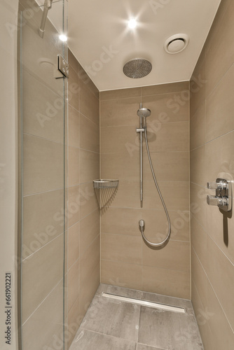 a walk in shower that is very clean and ready to be used for the bathroom reurrectionment