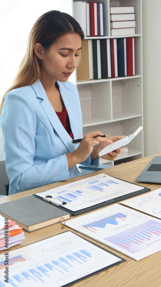 Thinking about how to take the business to technological heights. Cropped shot of an attractive young businesswoman working in her office. Thinking about how to take the business to technological heights. Cropped shot of an attractive young businesswoman working in her office.