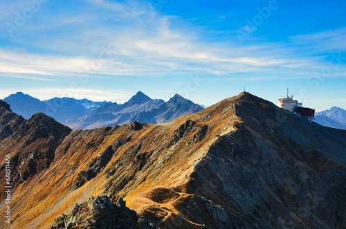 Beautiful autumn hike to the Jakobshorn above Davos Klosters Mountains. Mountaineering in the Swiss Alps Grison. High quality photo photo