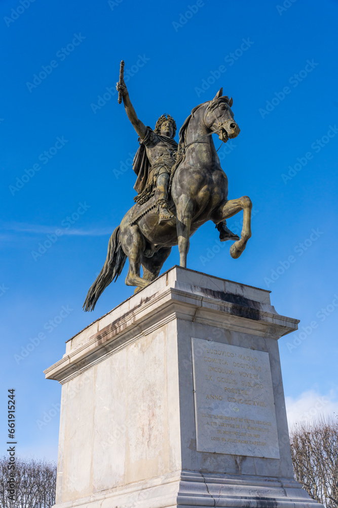 Obraz premium Montpellier, France - January 16 2023 - The Promenade du Peyrou. Paved city square with a statue of Louis XIV