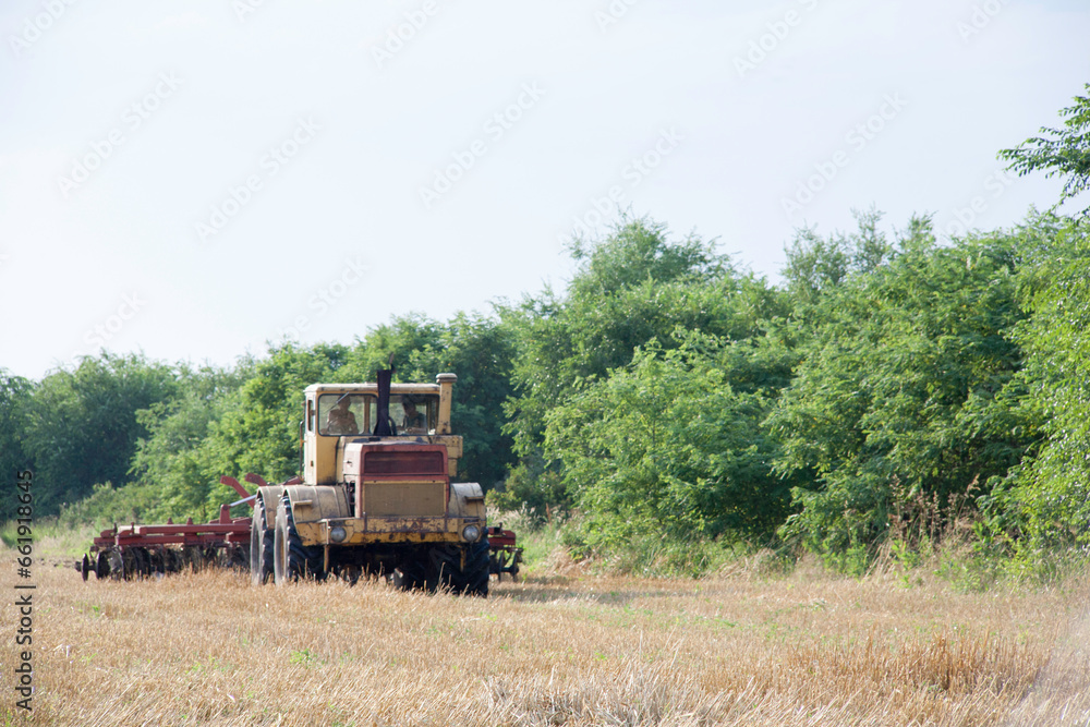 Fototapeta premium Russian tractor K-700 Kirovets. Large yellow USSR tractor designed for towing military equipment