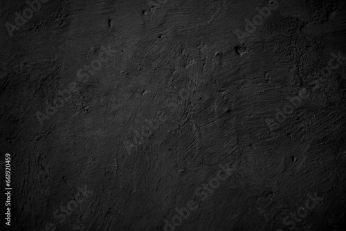 Textured black grunge background. Black concrete texture as a concept of horror and Halloween © Background Studio