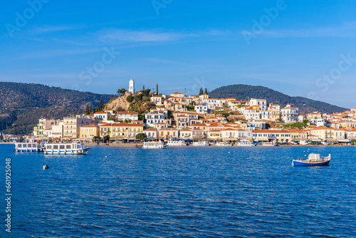 Poros, Greece - 17 February 2023 - View on the town of Poros on Poros island seen from the mainland © ivoderooij