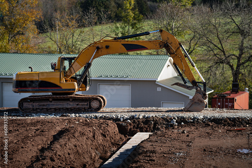 Excavator at work on a Country Side Construction Site