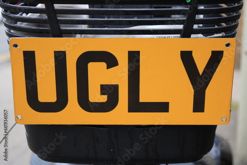 Yellow sign with black text 