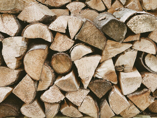 Fototapete Brennholz Textur A close up picture taken from an outdoor log store full of seasoned cut wood ready to burn  © Corner Photography