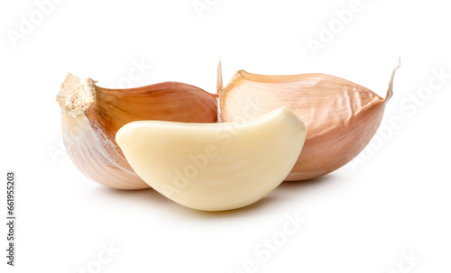 Fresh garlic cloves in stack isolated on white background with clipping path